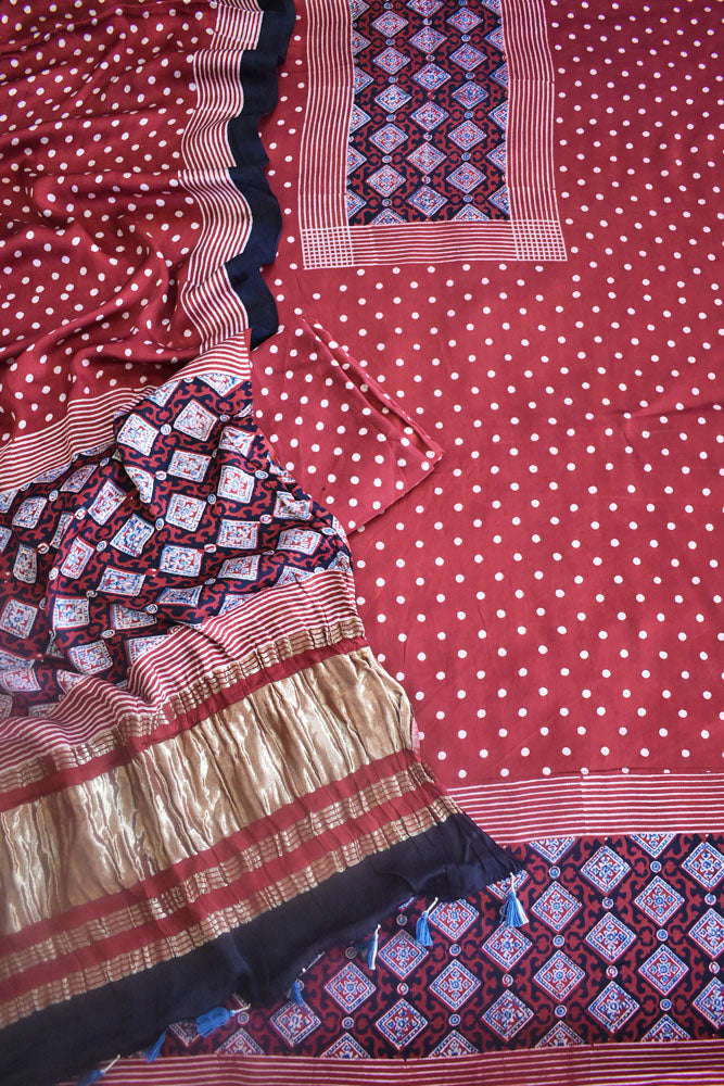 Beautiful Hand Block printed Kutch Ajrakh Modal silk suit with Lagdi patta