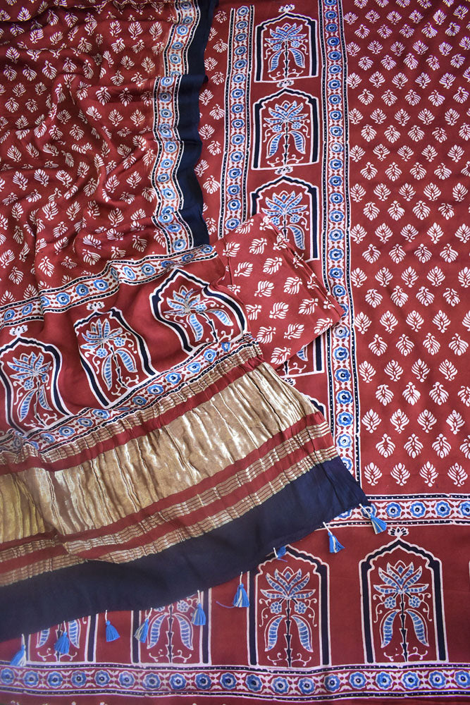 Beautiful Hand Block printed Kutch Ajrakh Modal silk suit with Lagdi patta